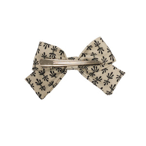 Floral bow in charcoal